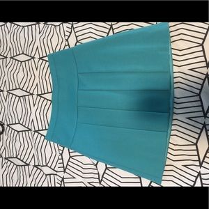 Turquoise tennis style mini skirt